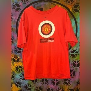 Size: Large / Color: Red with Black, Yellow, & White Designs / Brand: Nike